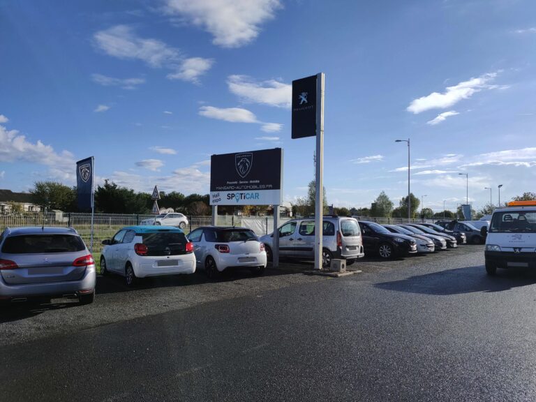 Changement enseigne garage Peugeot Mansard